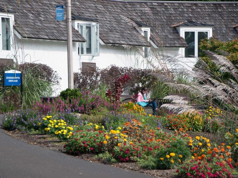 Springhouse building with flowers