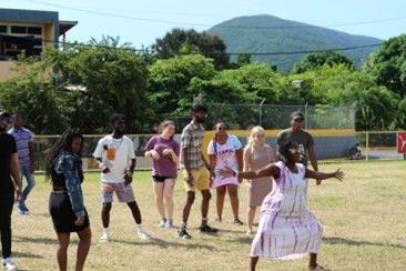 A group of students playing a game outside