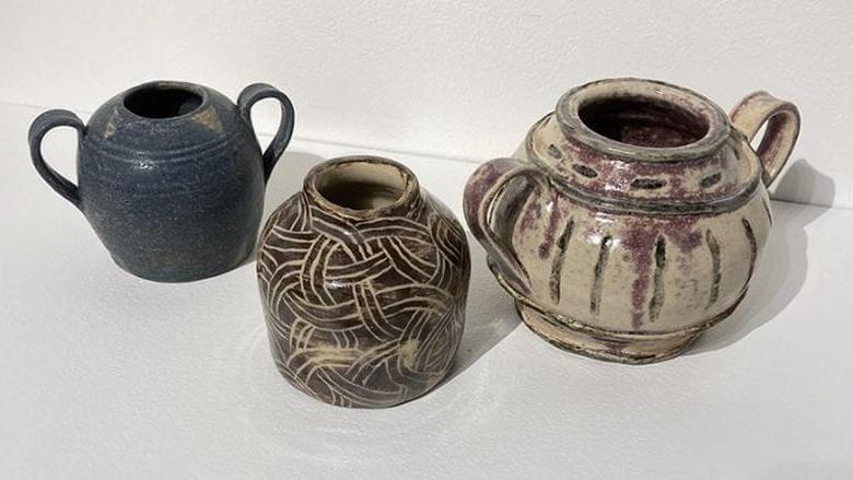 3 ceramic pots Left to Right: Ancient Pot, Sgraffito Pot, Blue Pot